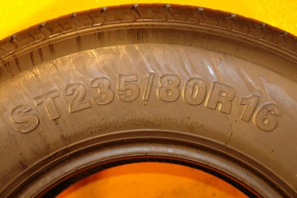 4 used tires ST 235/80/16 COMMODORE - Image 8